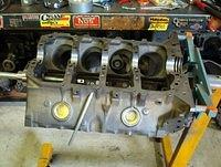 Some install the front camshaft bearing first and work their way rearward.  Some even do it middle out then rear from each opposite end.  Now there are many ways as you can see.