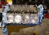I have modified the pistons, rods, crankshaft, timing, camshaft, block, heads, intake, carburetors, distributor, water pump cover, water pump, oil filter housing, oil pan, oil pump, every trick I know is in this engine.