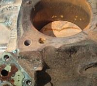 This cylinder had been rotated while the rust was in the bore. Now that is really a big NO NO. Do not attempt this in any manner. First remove the rust from above the piston and then and only then soak the top of the piston with brake fluid for a da...