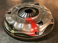 Here is the Pressure Plate and Flywheel that we balanced for MArcos.  You will notice the red paint, the extra weights welded on and the Drill holes to lighten the hat in places.