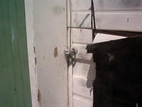 Missing Lock, Funny Holes in Garage Doors