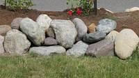 Rocks to cover water valve access.  Good idea as long as you do not have to move them.  Oh did I mention they are heavy.