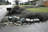 Big rocks are fun.  You have to love moving these.  Now and then we utilize a rock buddy to help us along.  In this step of the planning you have to concern yourself with the size of the rocks and placement.