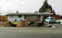 This place is really looking like a pit.  You got your big boulders, piles of dirt, unpainted house and old roof.  Not to mention that the money spent on this project would of purchased a better home on a bigger lot of ground.